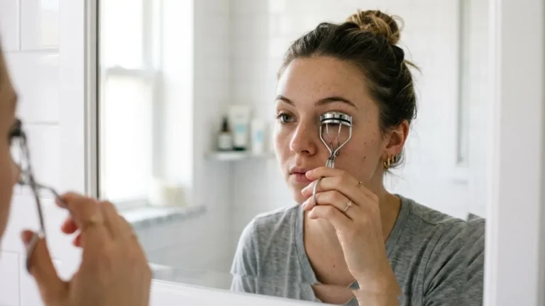 do you use an eyelash curler before or after mascara
